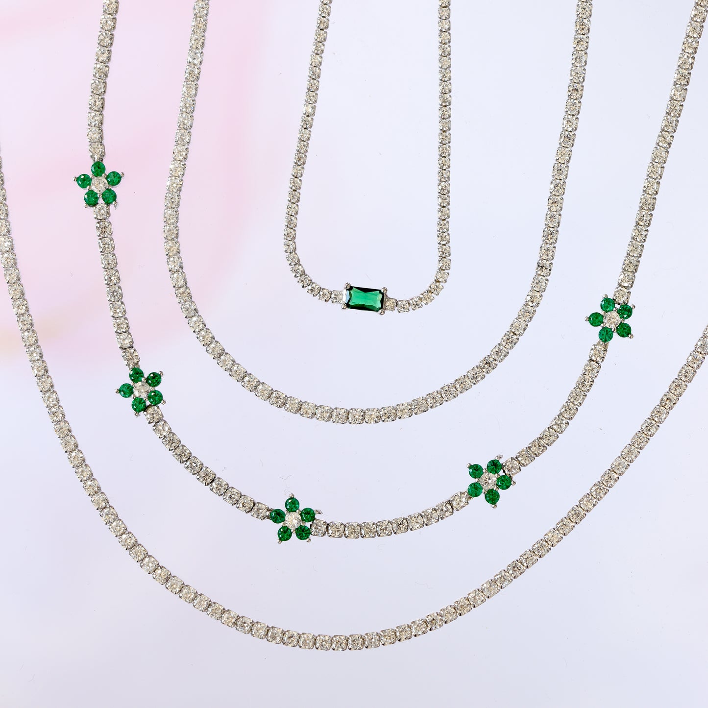 CLASSIC TENNIS NECKLACE WITH EMERALD CENTERPIECE (1st one from top to bottom)