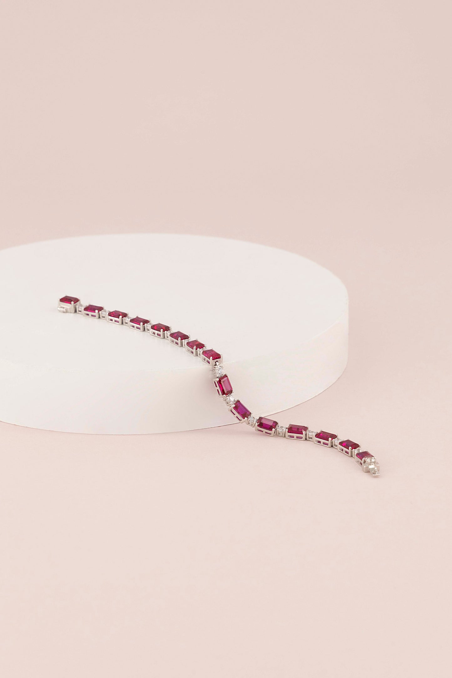 THE “RUBY BLANC” TENNIS BRACELET BAGUETTE CUT