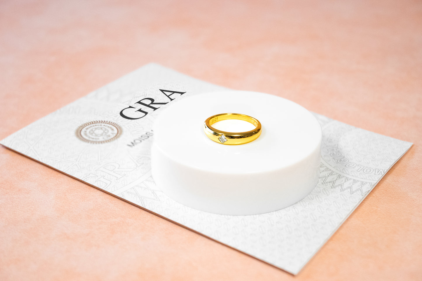 BOLD GOLDEN BAND WITH A PRINCESS-CUT MOISSANITE CENTERPIECE