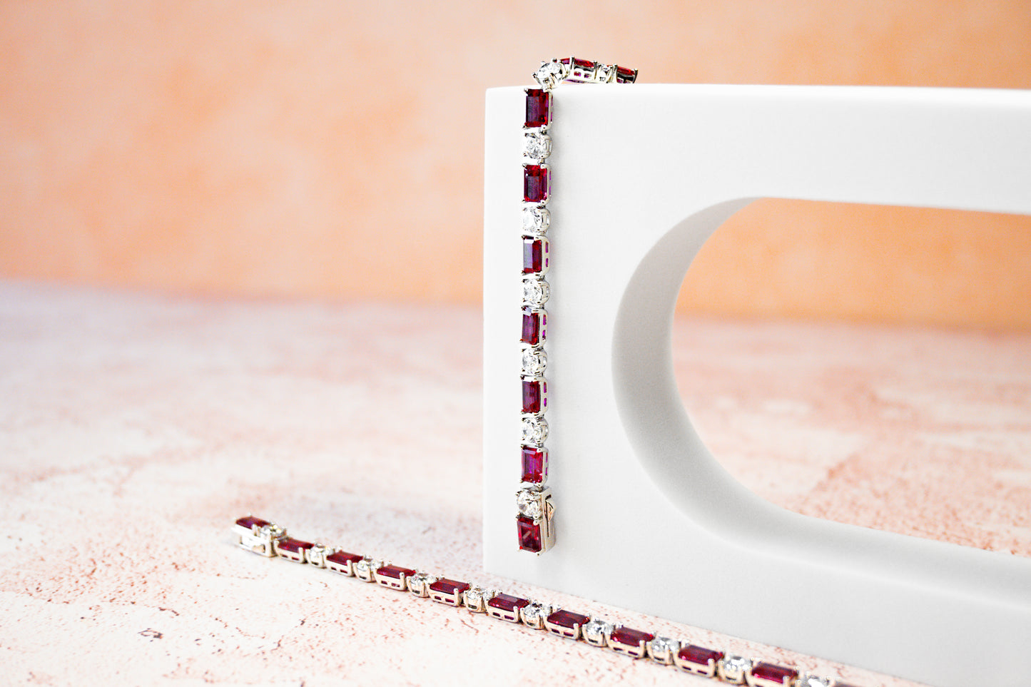 THE “RUBY BLANC” TENNIS BRACELET BAGUETTE CUT