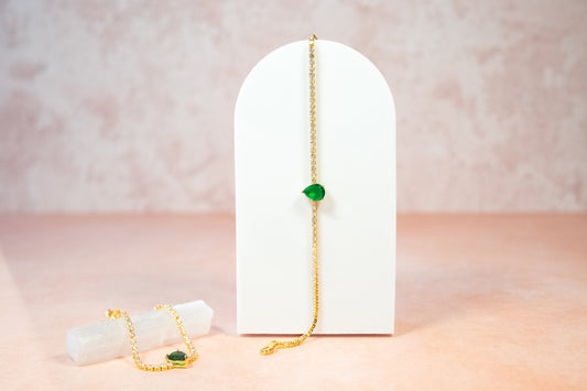 THIN TENNIS BRACELET WITH EMERALD DROP