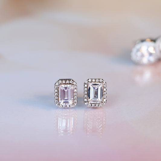 MOISSANITE EMERALD CUT STUDS WITH HALO