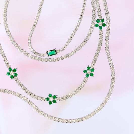 CLASSIC TENNIS NECKLACE WITH EMERALD CENTERPIECE (1st one from top to bottom)